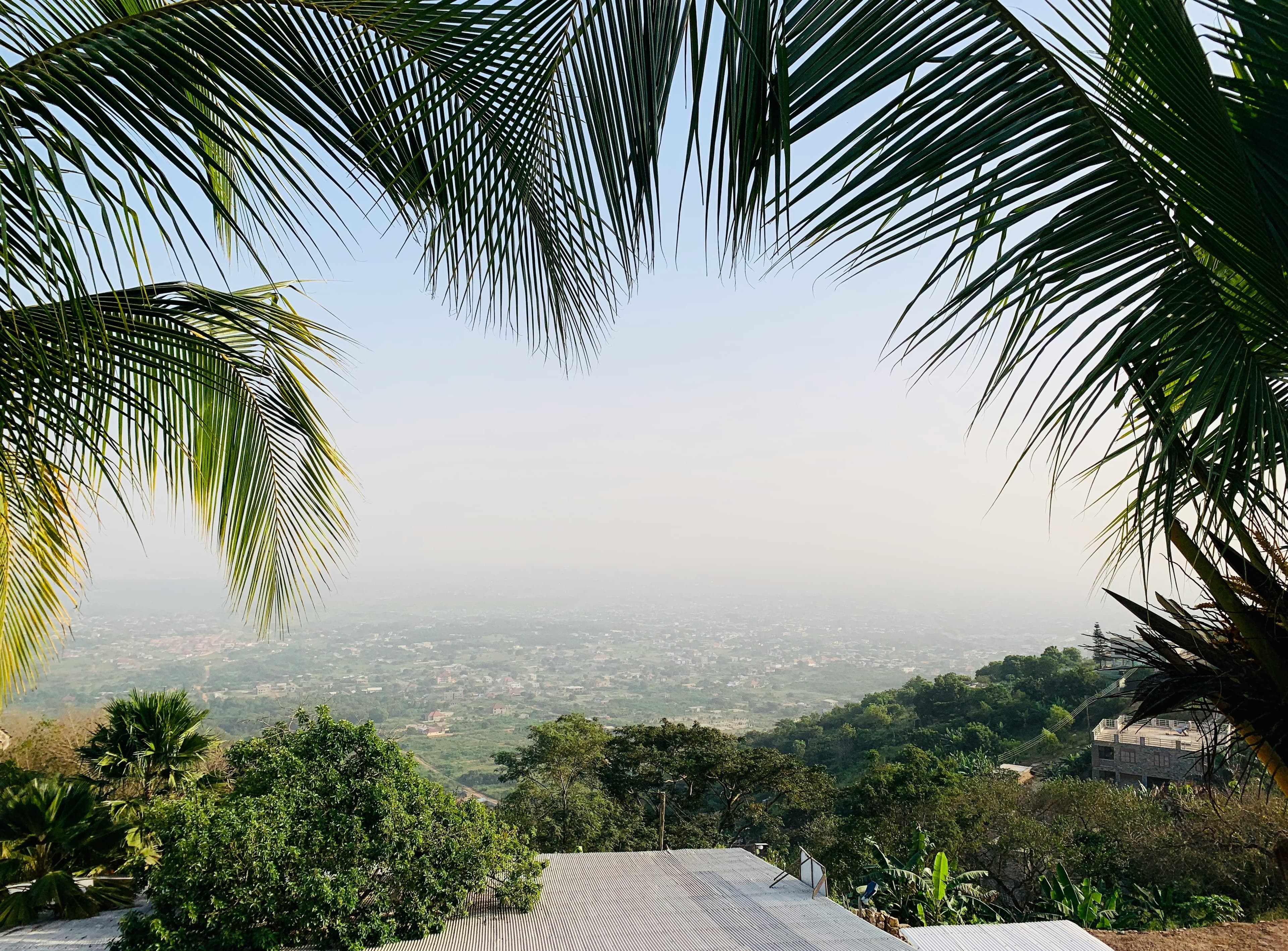 A sweeping Ghanaian coastal landscape at golden hour